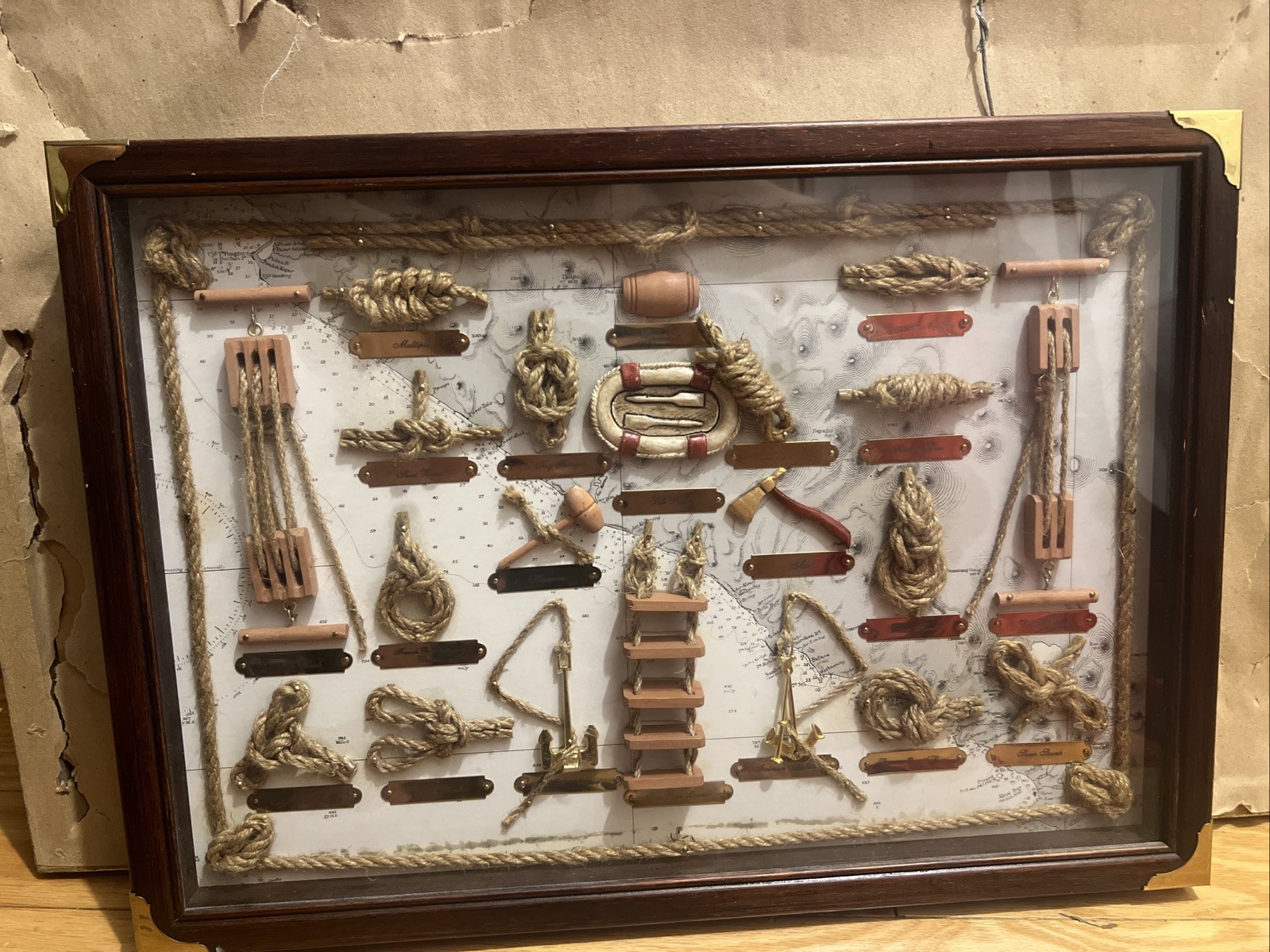Framed Nautical Display with Ship Model, Knots, Pulleys, and Instruments 20x15