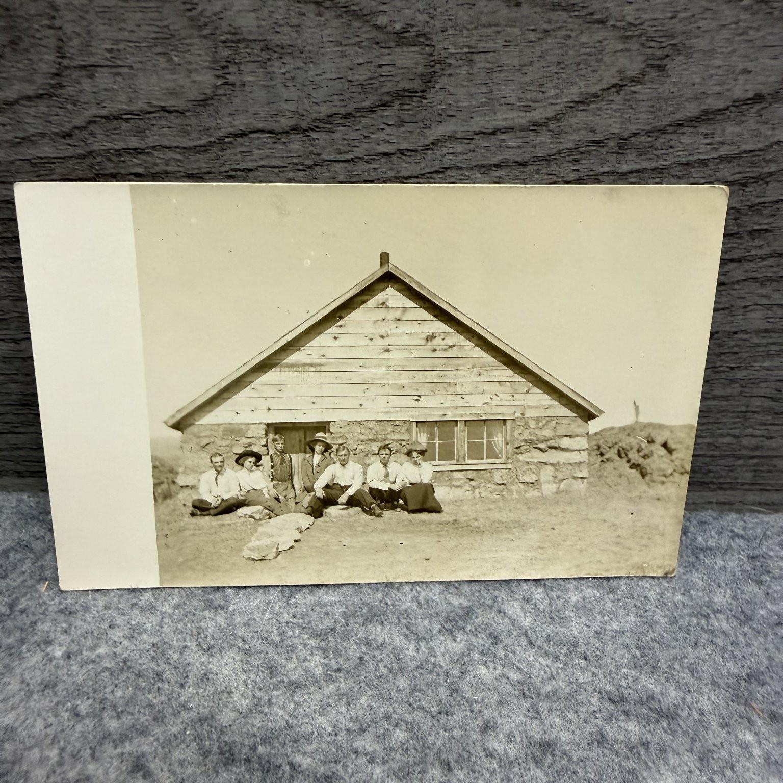 Vintage RPPC Rustic Sod Cabin Group Photo Postcard Early 1900s Pioneer Era