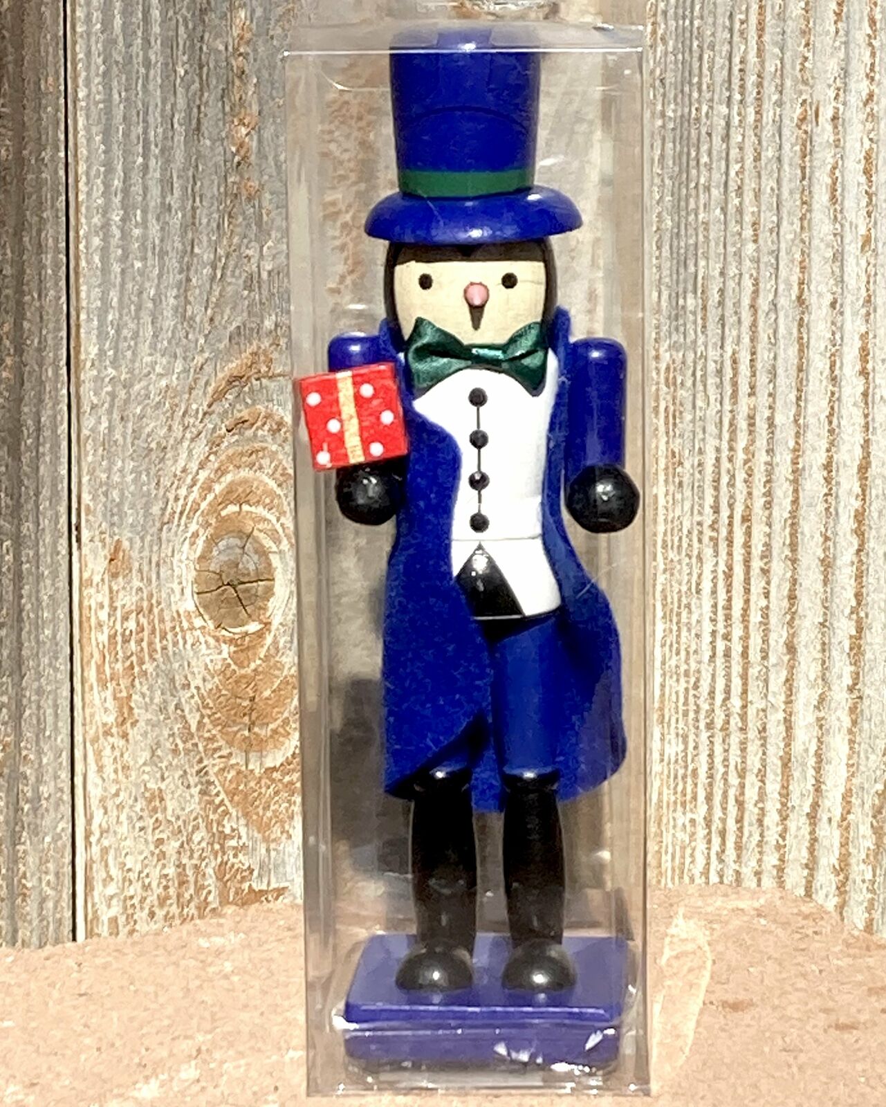 Penguin holding Present Nutcracker Collectible Christmas Decor