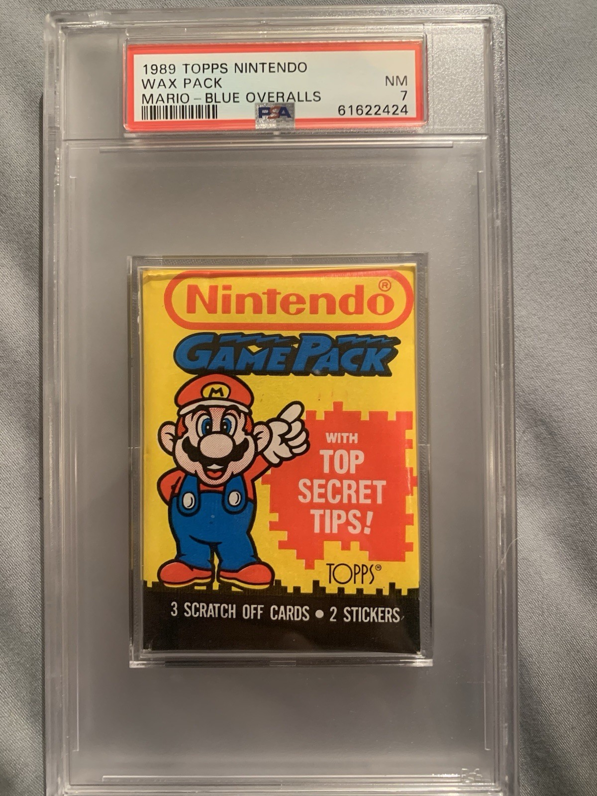 1989 Topps Nintendo Wax Pack Mario - Blue Overalls PSA 7 sealed pack 1989 Topps Nintendo Wax Pack Mario - Blue Overalls PSA 7 sealed pack