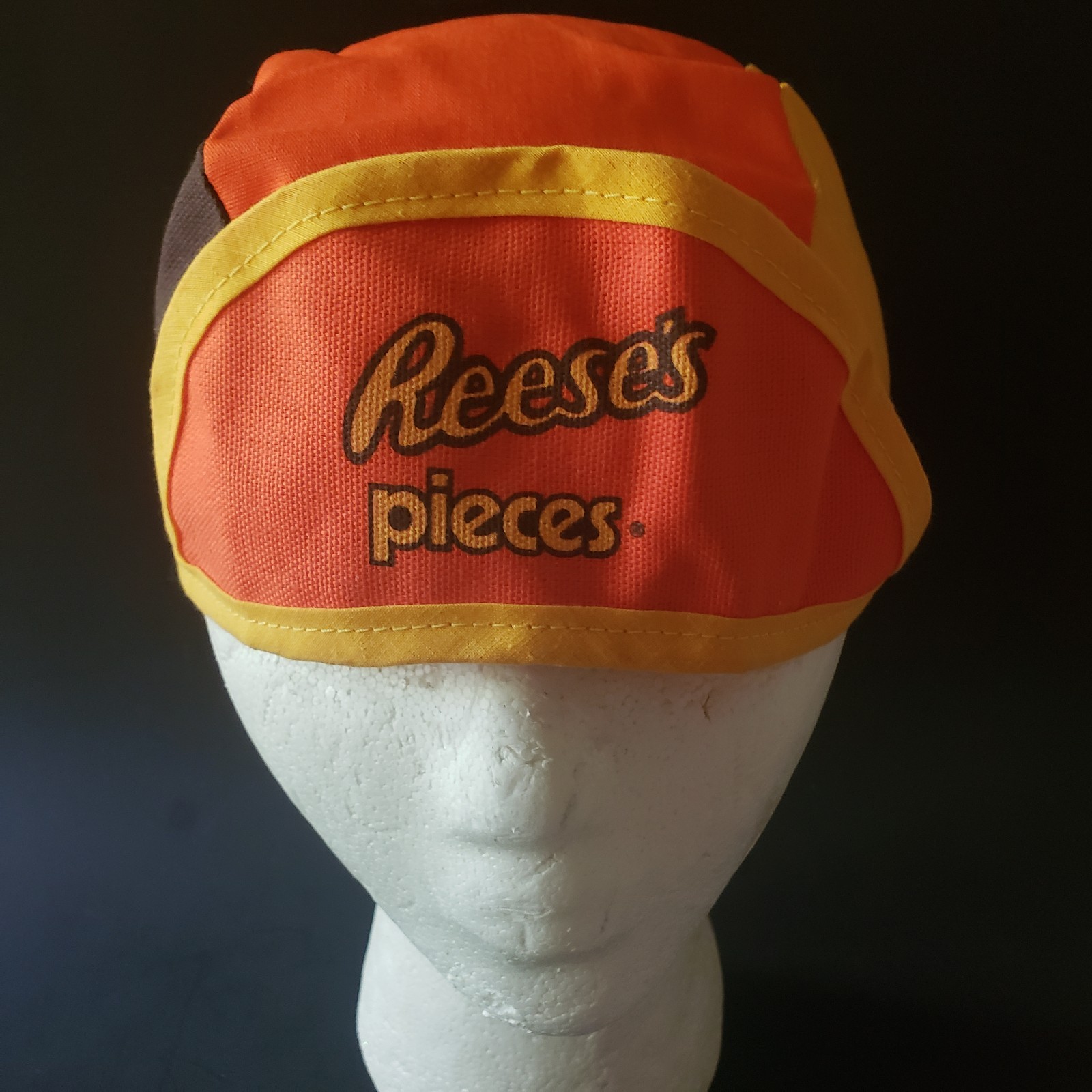 Vintage Reese's Pieces Candy Elastic Back Brown Yellow Orange Cloth Cap Hat 