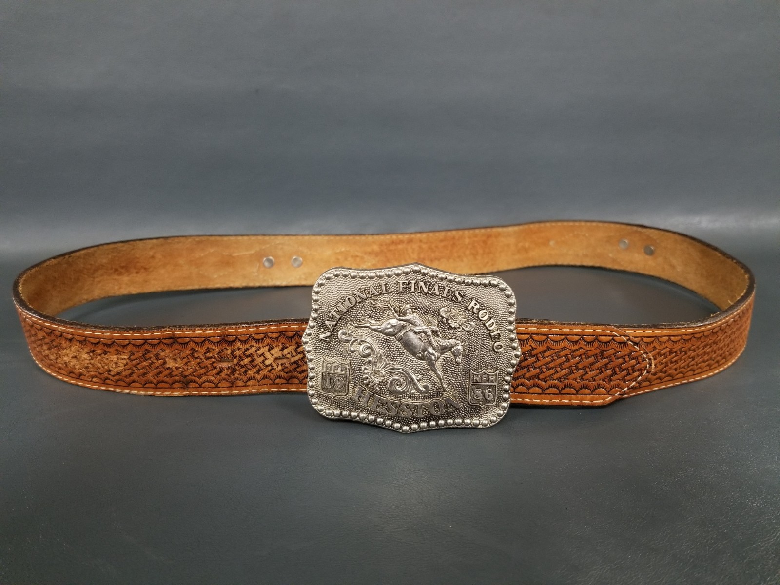 Vintage Toded Leather Belt w/ 1986 Hesston National Finals Rodeo Buckle Vintage Toded Leather Belt w/ 1986 Hesston National Finals Rodeo Buckle
