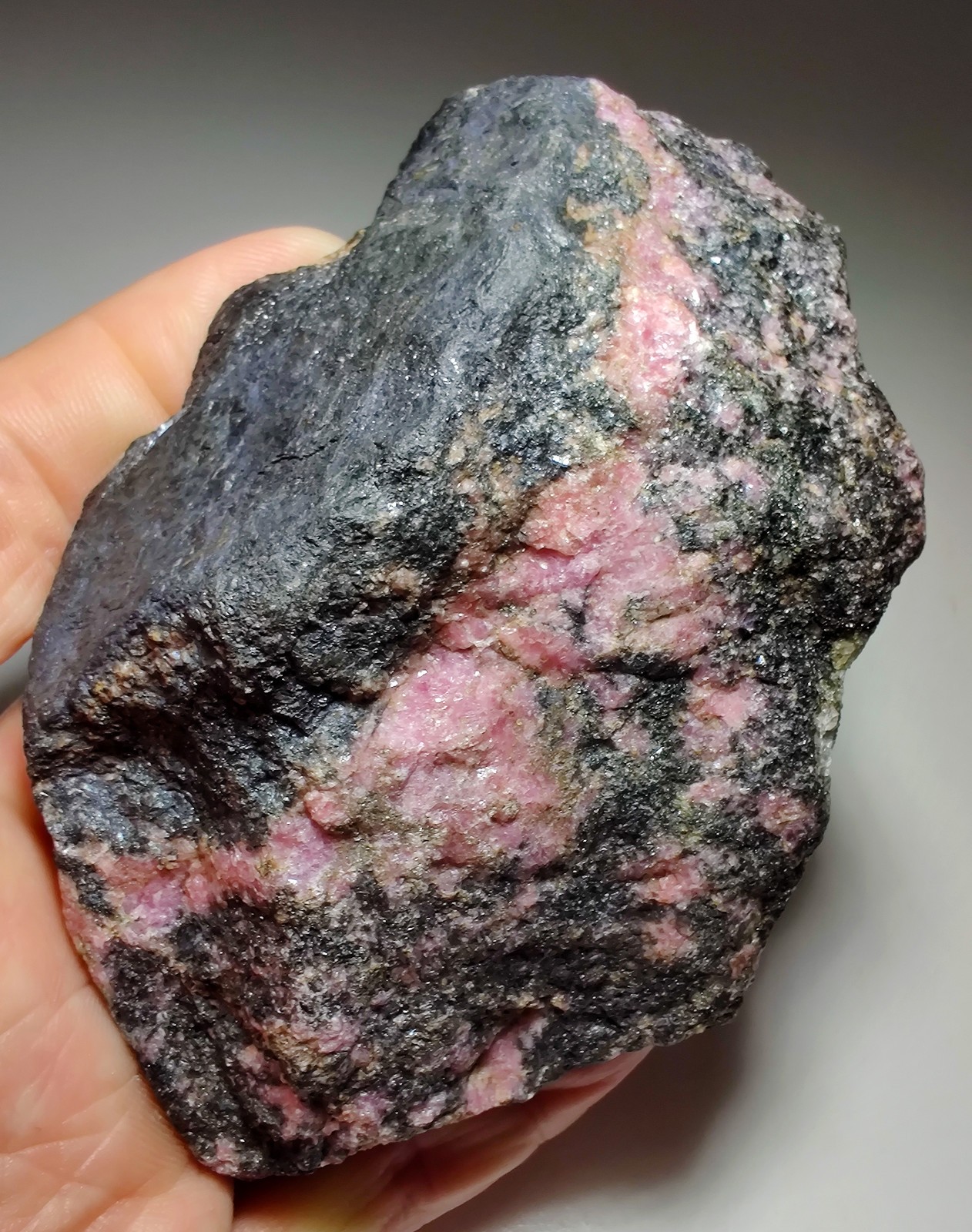 Rhodonite in Manganese matrix, great colors. Ampanihy, Madagascar. 450 grams. Rhodonite in Manganese matrix, great colors. Ampanihy, Madagascar. 450 grams.