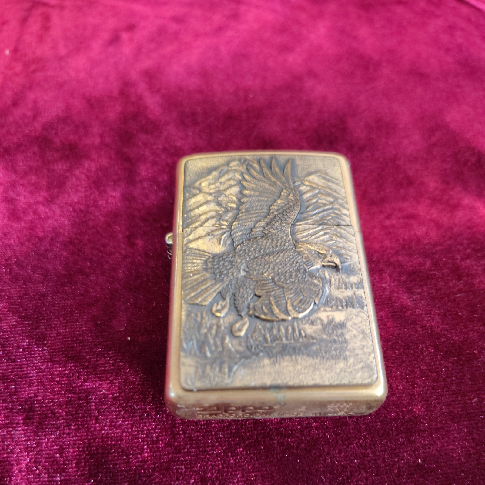 2002  Zippo  AMERICAN EAGLE AND MOUNTAINS BRASS. Un-fired with Tin box 