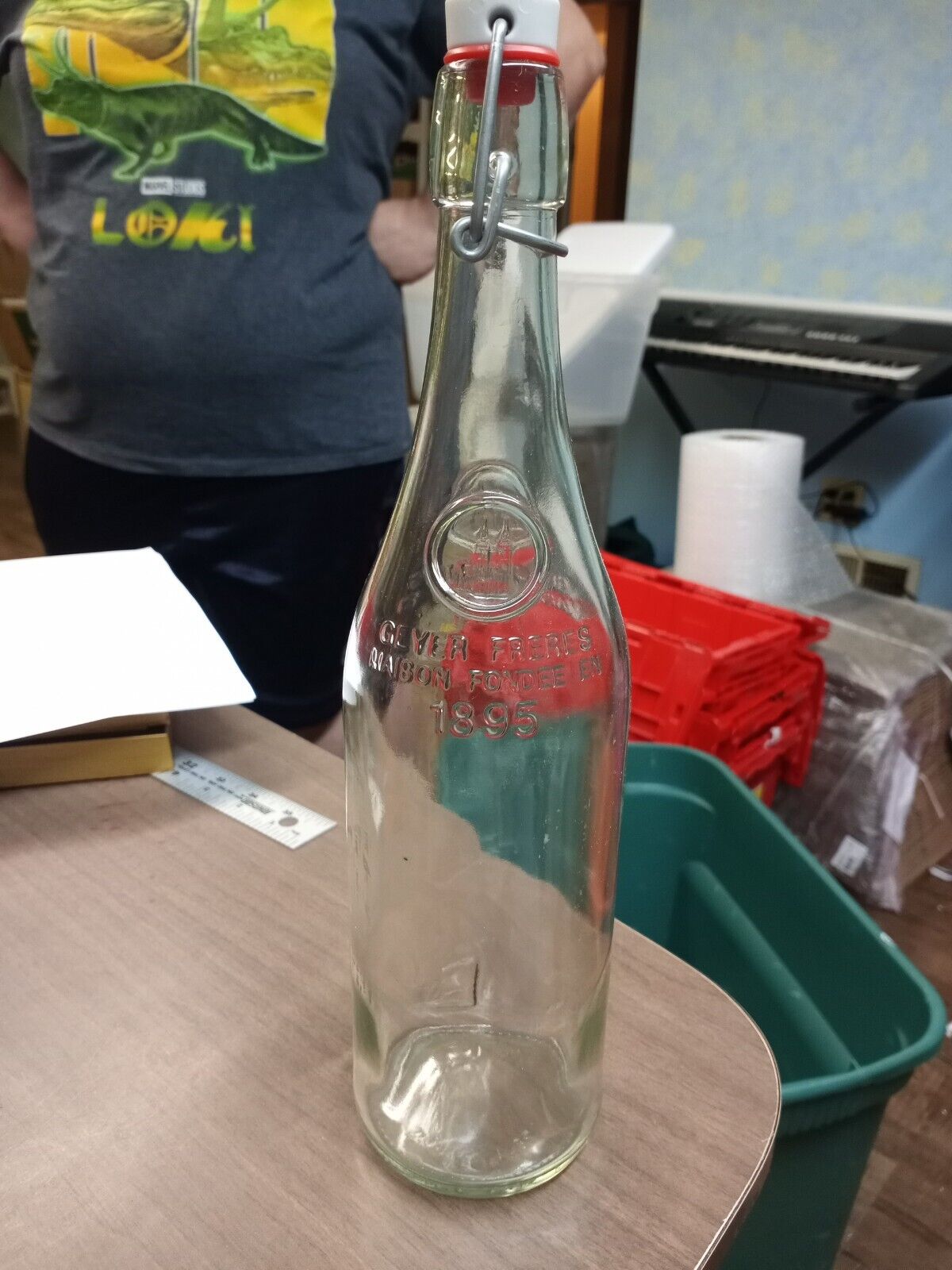 EMPTY Geyer Freres Maison, Fondee En 1895 Clear Glass Bottle with Cap
