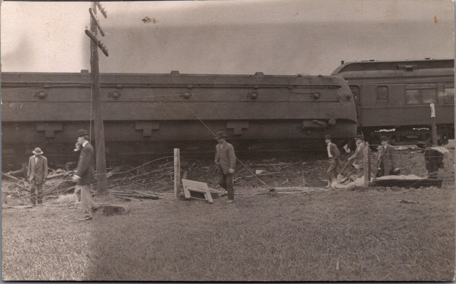 Vintage RPPC Train Wreck Derailment Disaster Postcard Men Crowd Scene