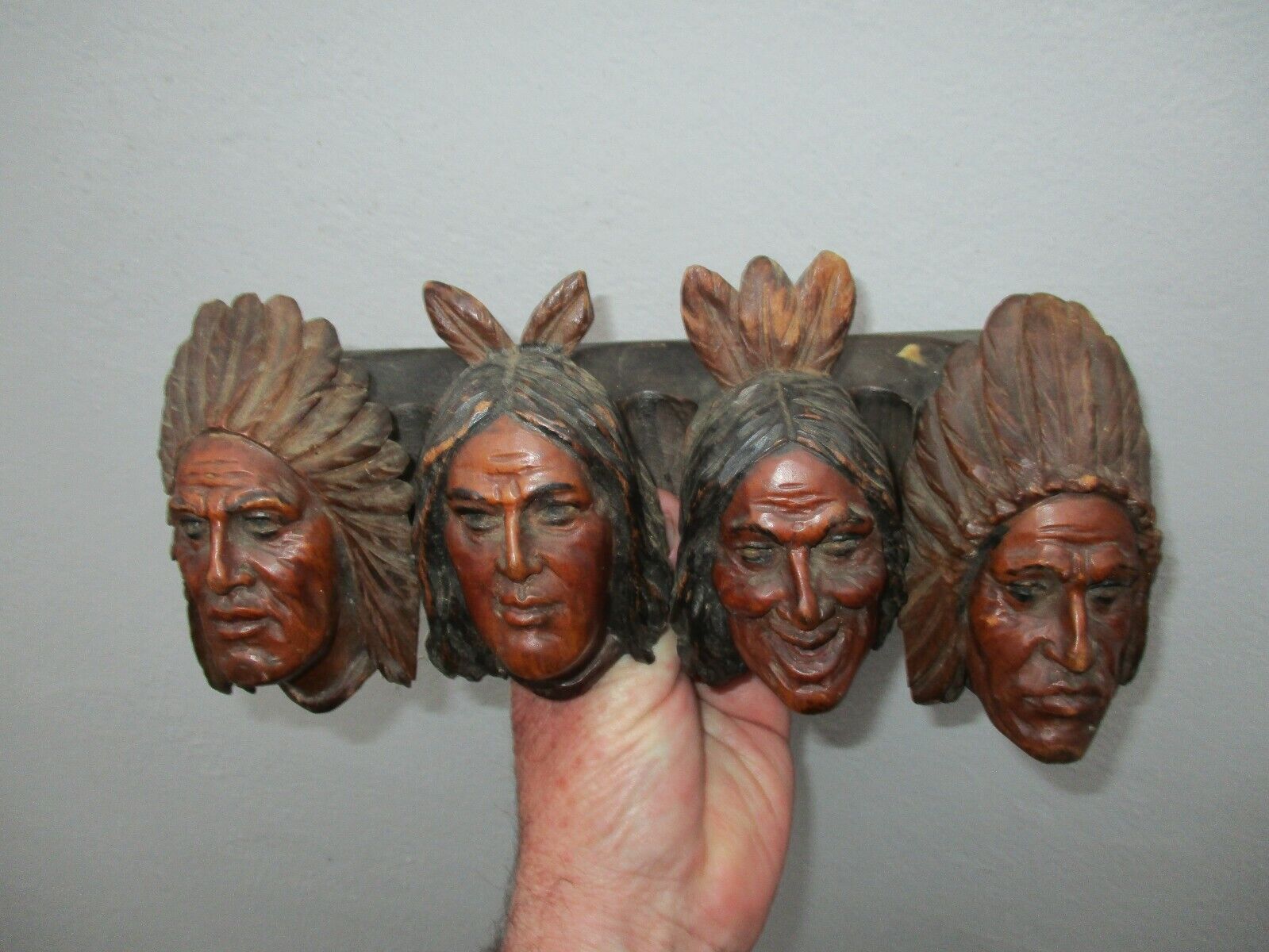 An Antique Carved Wooden American Indian Heads Pipe Rack c1890/1900