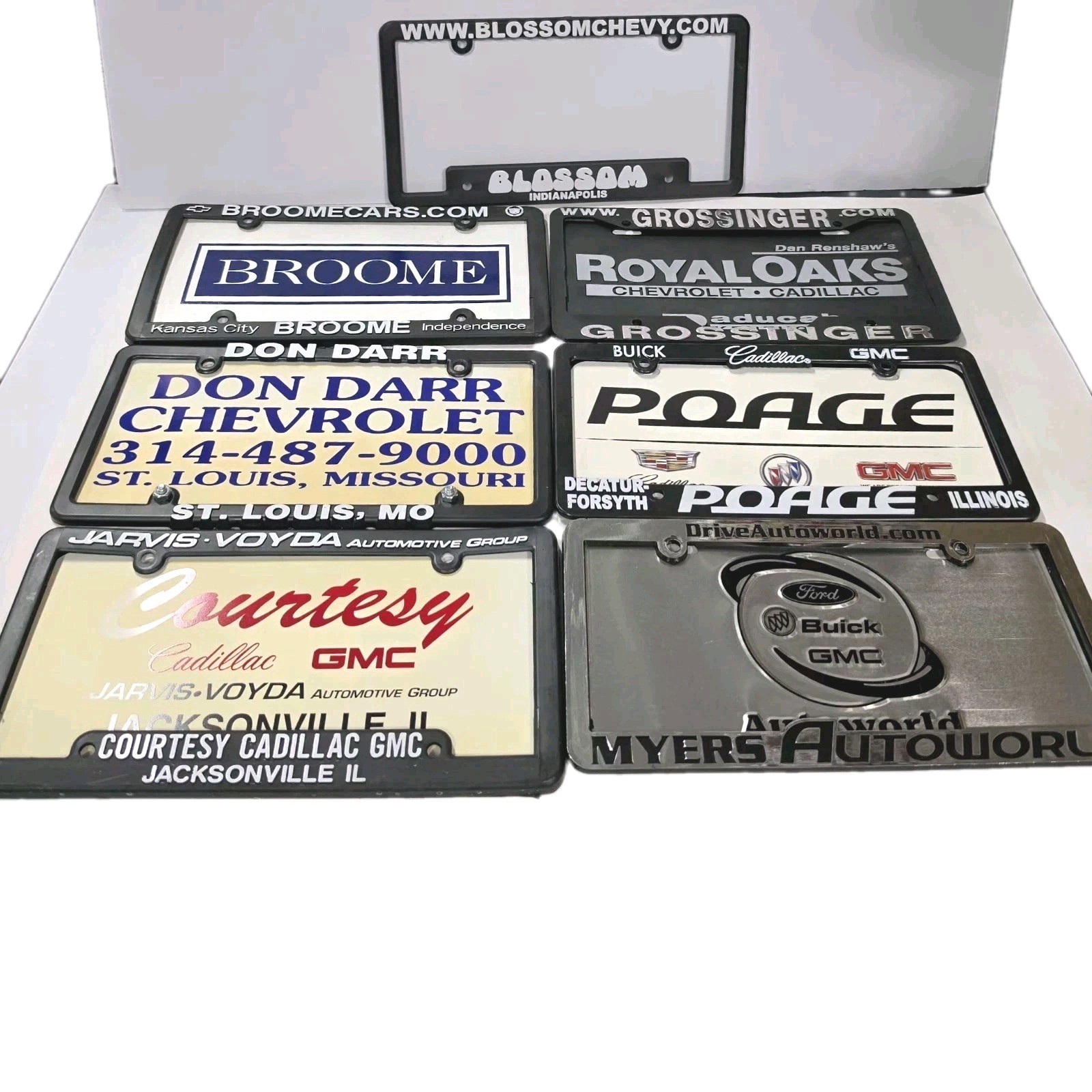 Lot of 7 Vintage Plastic Dealership License Plate Frames Inserts Chevrolet GMC