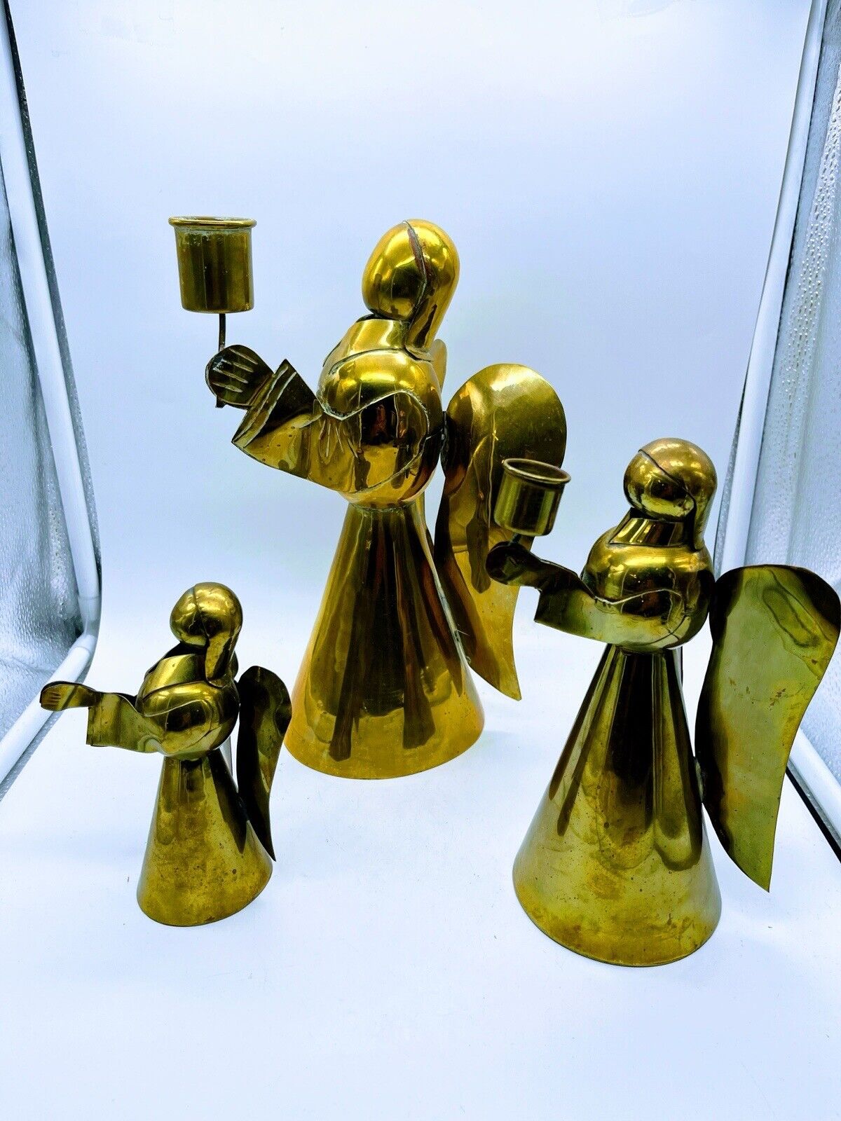 Set Of Three Brass Mexican Angel Candleholders