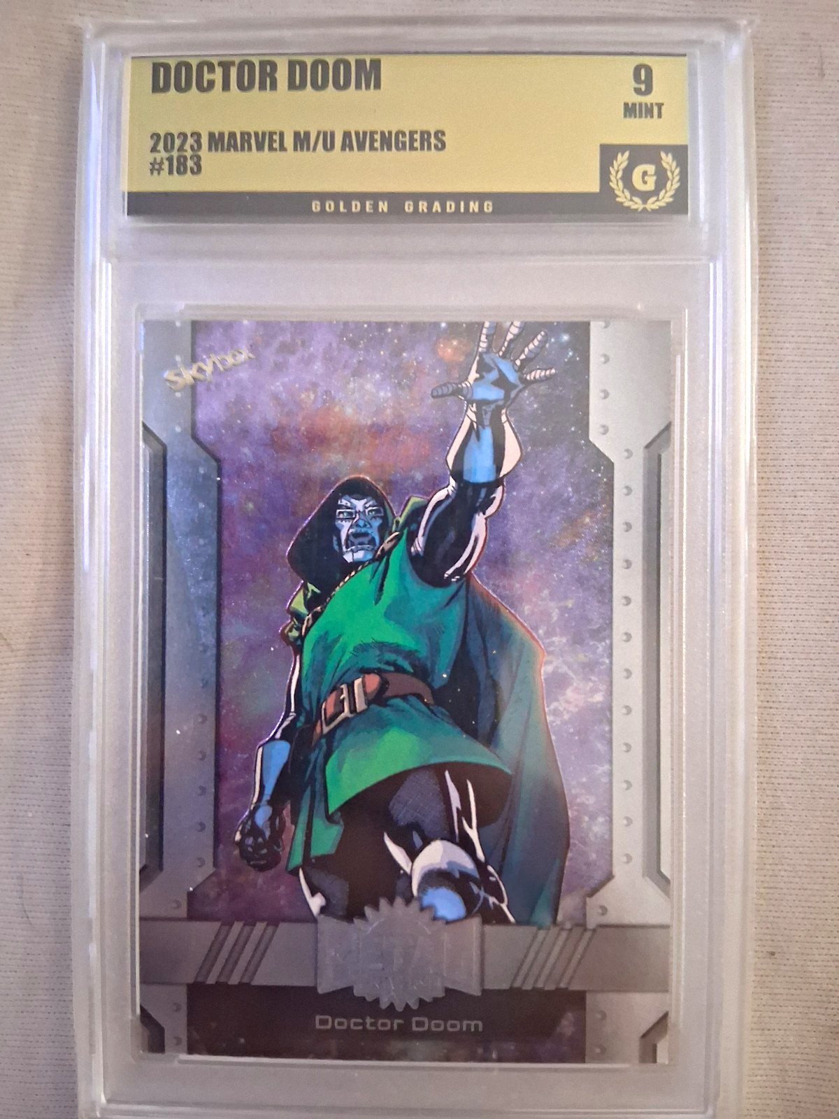 Doctor Doom 2023 SkyBox Metal Universe Avengers Graded Golden Grading #183 Doctor Doom 2023 SkyBox Metal Universe Avengers Graded Golden Grading #183