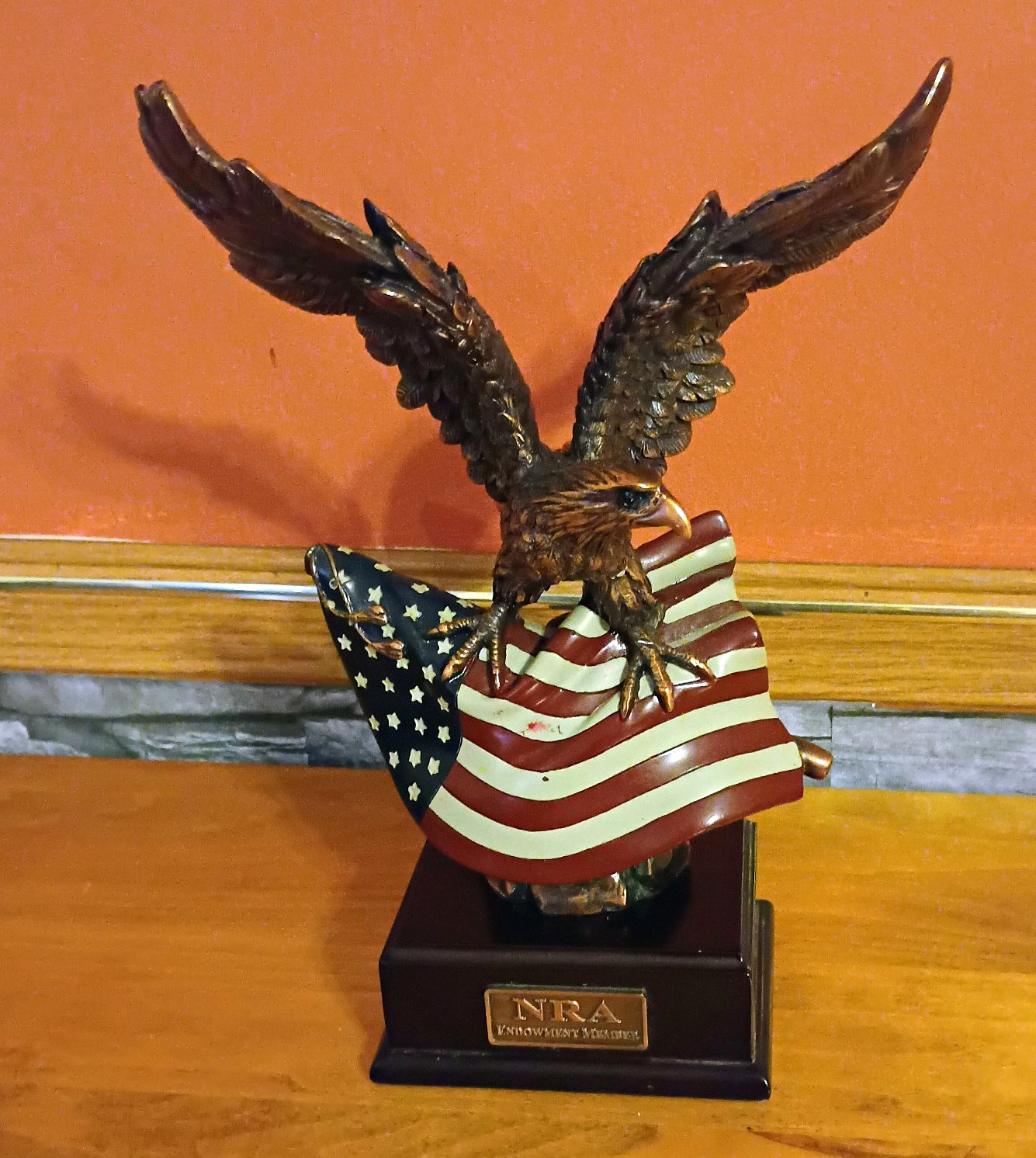 Brass Coated Eagle With American Flag  NRA Lifetime Member