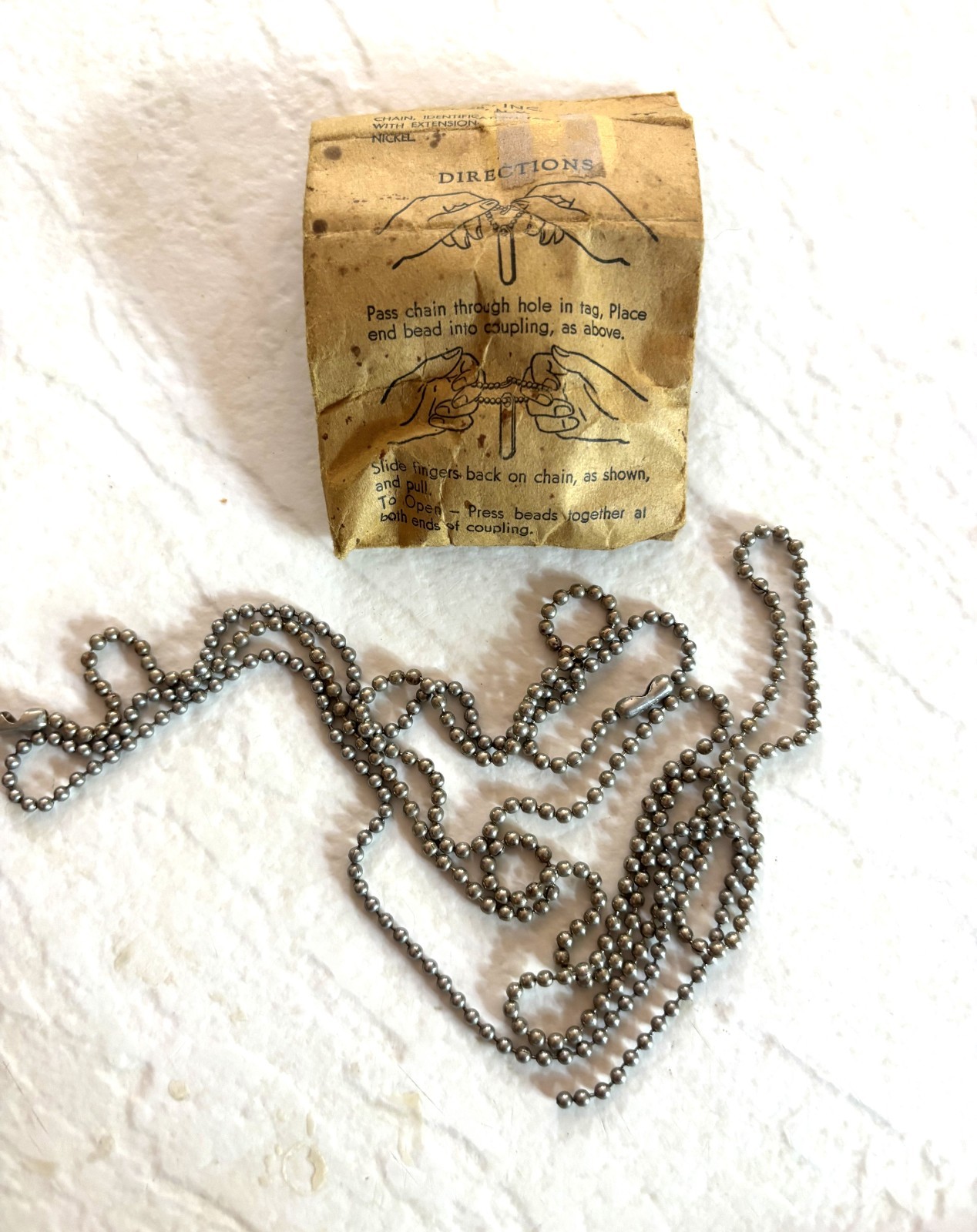 WW11 nickel dog tag chain with original envelope NS Meyer, Inc. N.Y,