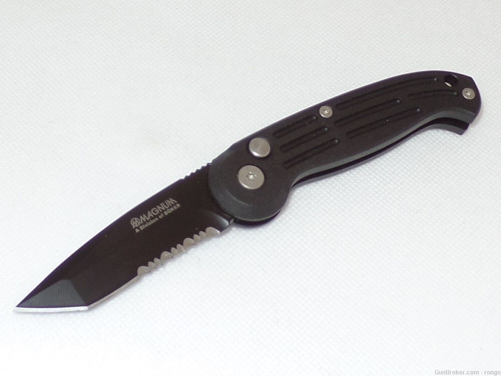 Boker Magnum  BLACK handles...........Button Lock. APPROX 3\