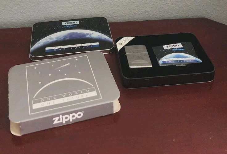 1999 MILLENNIUM ED TITANIUM COATED ONE WORLD ONE FUTURE ZIPPO LIGHTER. UNFIRED 