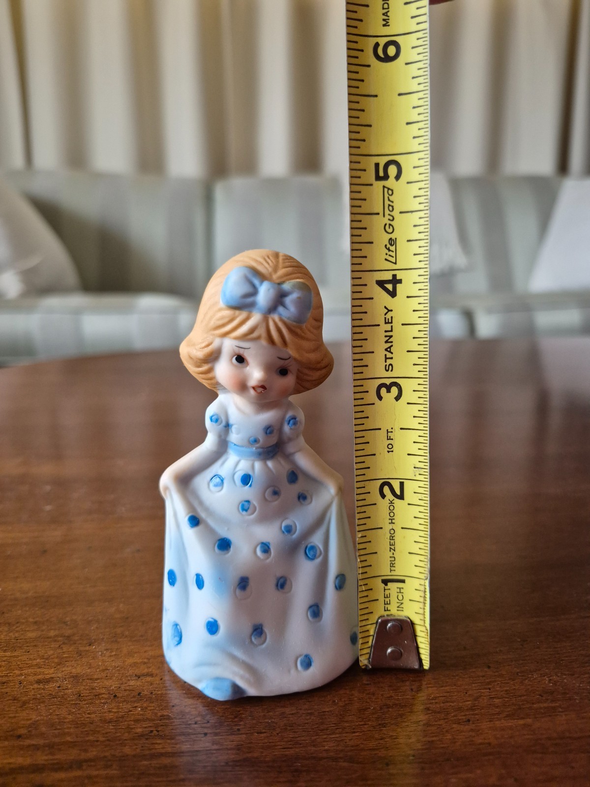 porcelain bell figurine of a girl