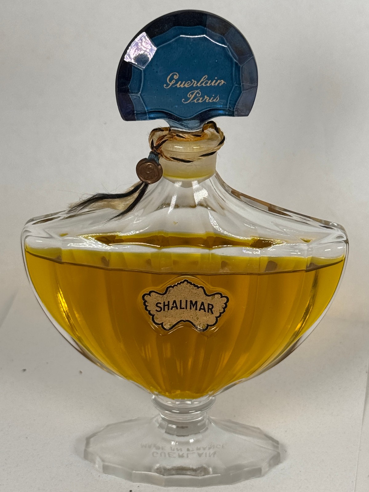 Vintage perfume factice bottle Shalimar Guerlain Paris hand tied tassle blue fan