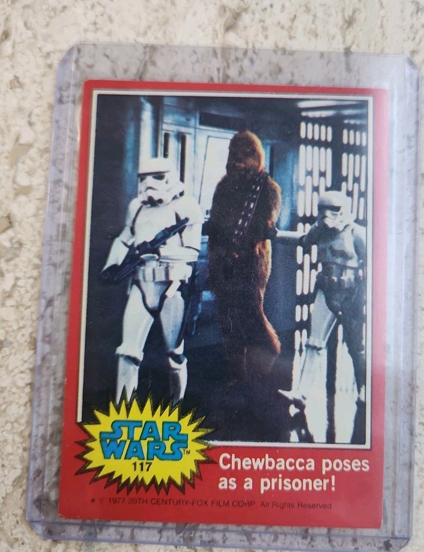 Vintage 1977 Star Wars Trading Card Red Series 2 #117 Chewbacca poses Ungraded Vintage 1977 Star Wars Trading Card Red Series 2 #117 Chewbacca poses Ungraded