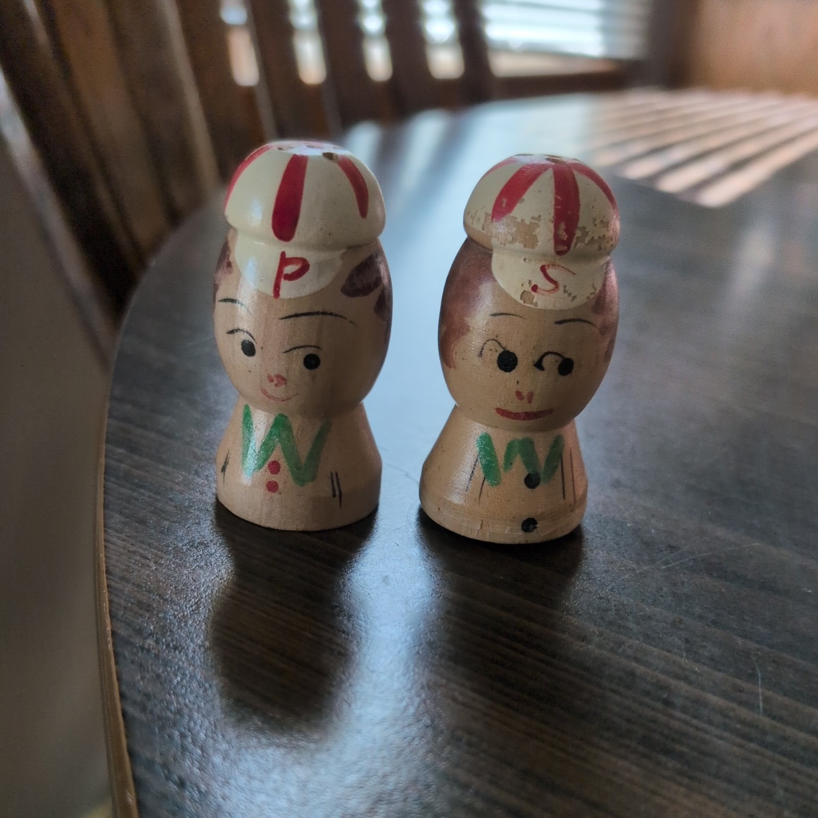 Vintage Salty and Peppy Wooden Salt and Pepper Shakers. Made In Japan.