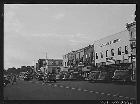 Photo:Florence Alabama 1940s Main Street Storefronts and Parked Cars
