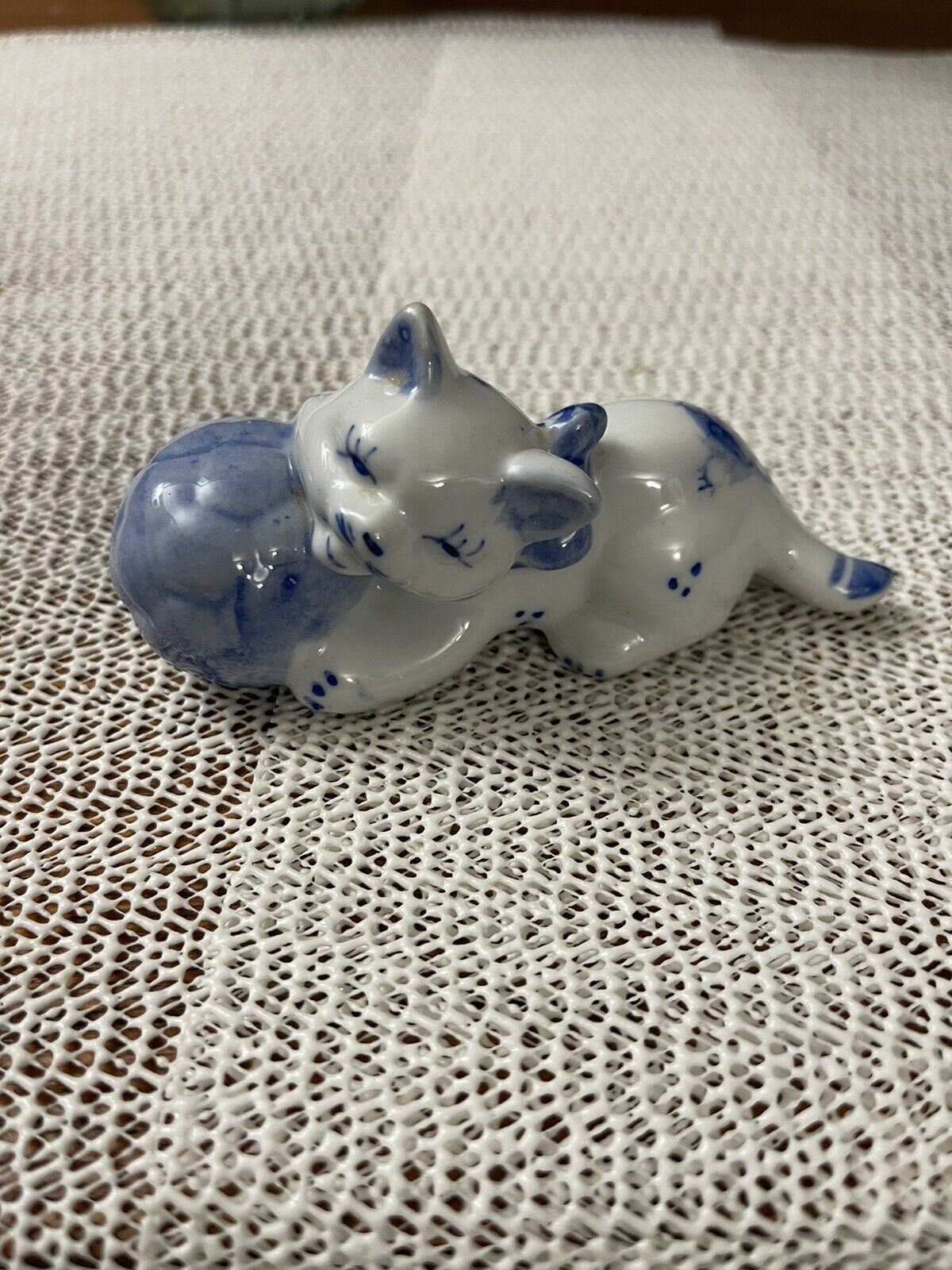 Vintage blue & white porcelain cat with soccer ball 4” long