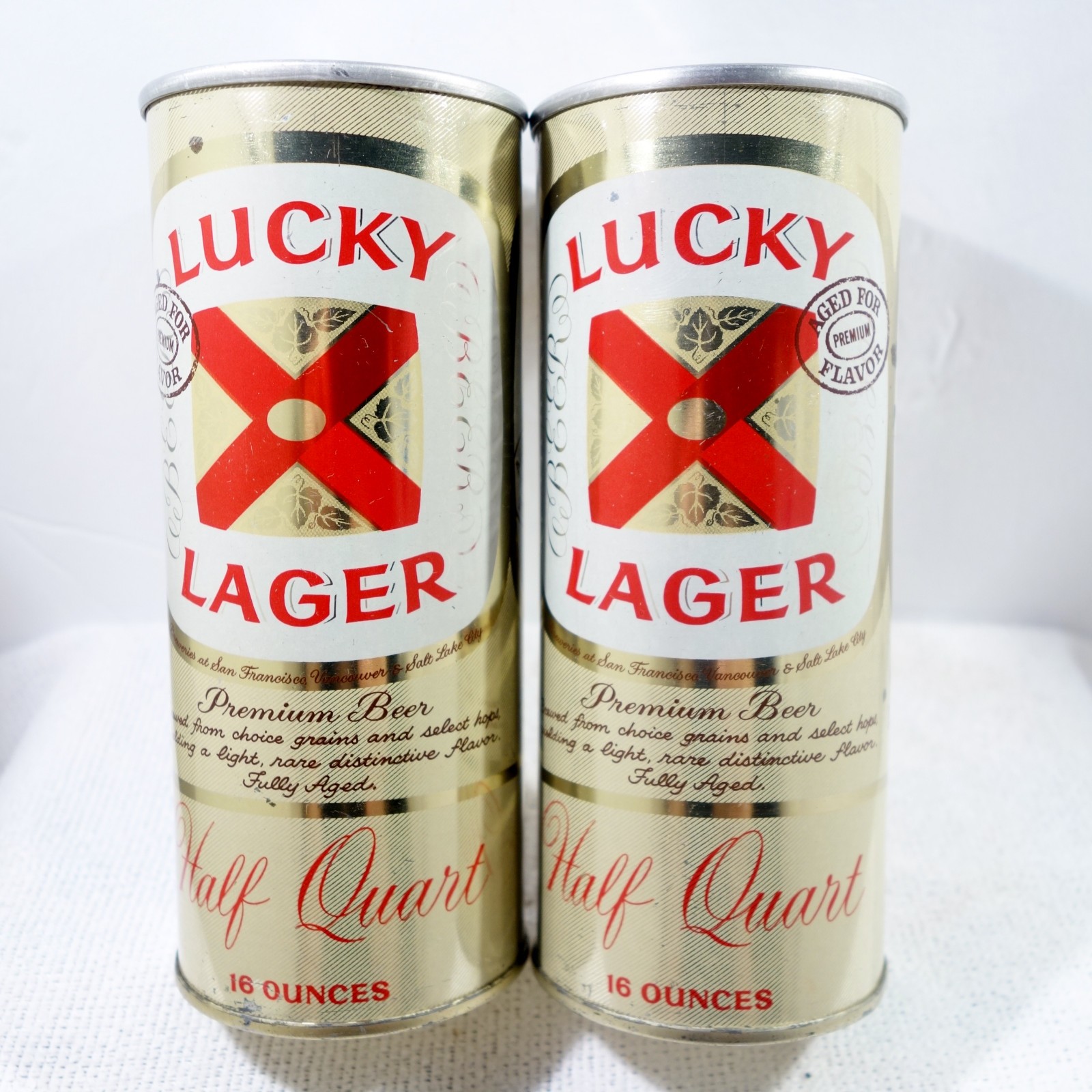2 Different 16 Ounce Lucky Lager Early Opening Instructional Pull Tab Beer Cans