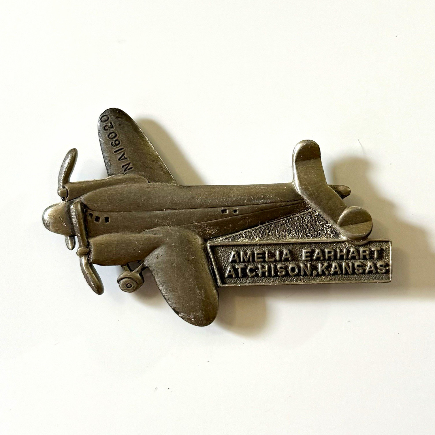 Vintage Amelia Earhart Atchison Kansas Airplane Metal Magnet Made in USA