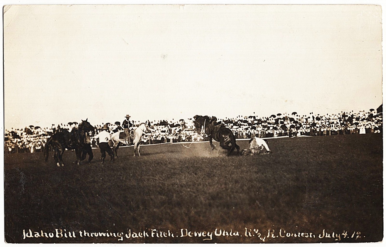 real photo Dewey OK - Idaho Bill Throwing Jack Fitch mailed 1913 antique pc RPPC