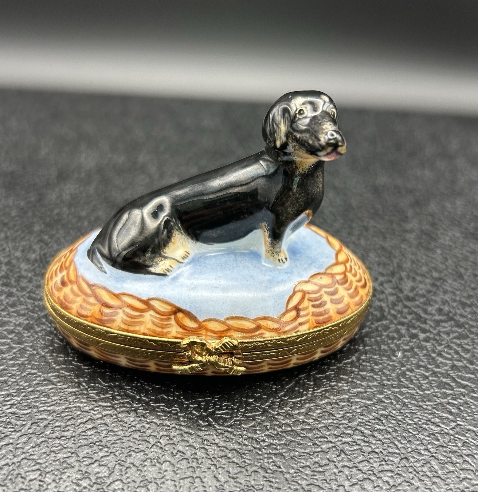 Vintage Artoria Limoges Black and Tan Dachshund Dog in a Basket Trinket Box￼