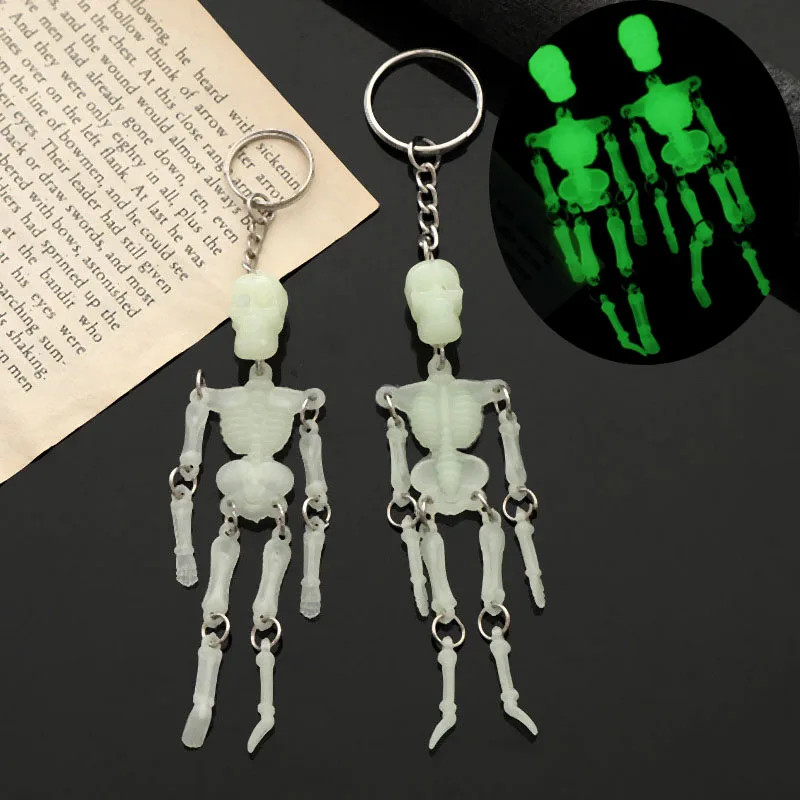 1pcs Creative Skull Shaking Skeleton Luminous Keychain Men and Women Key Ring Pe