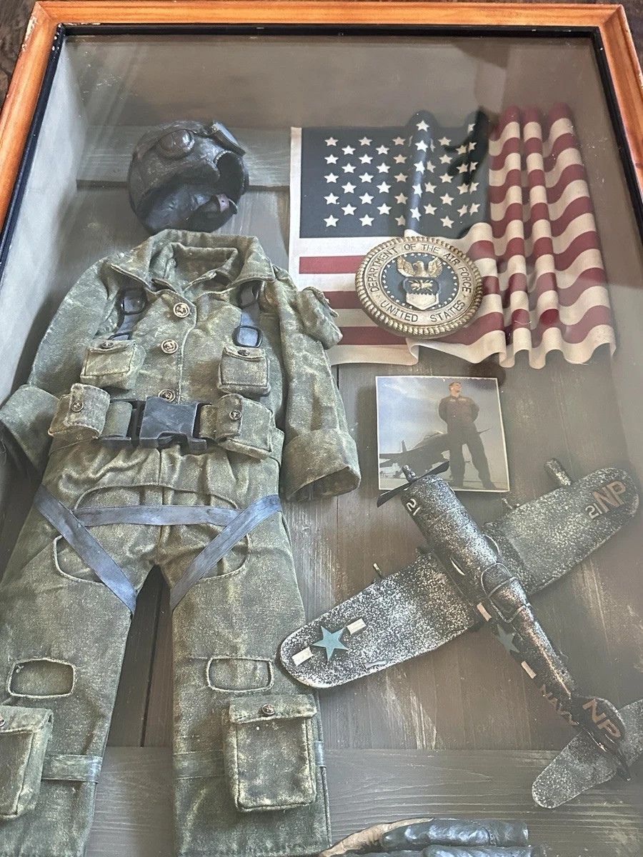 The Military Tribute Shadow Box is a collectible item designed to honor Air Forc