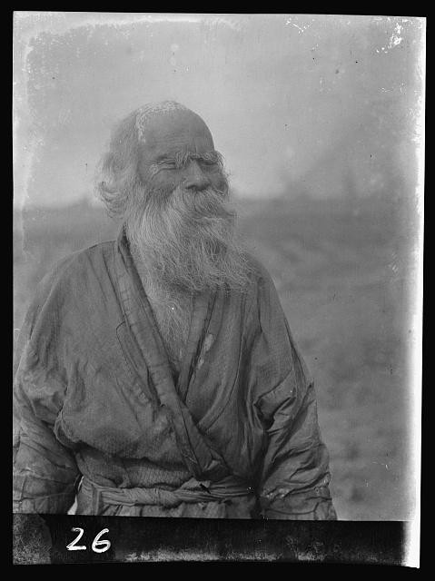Photo:Ainu man standing outside