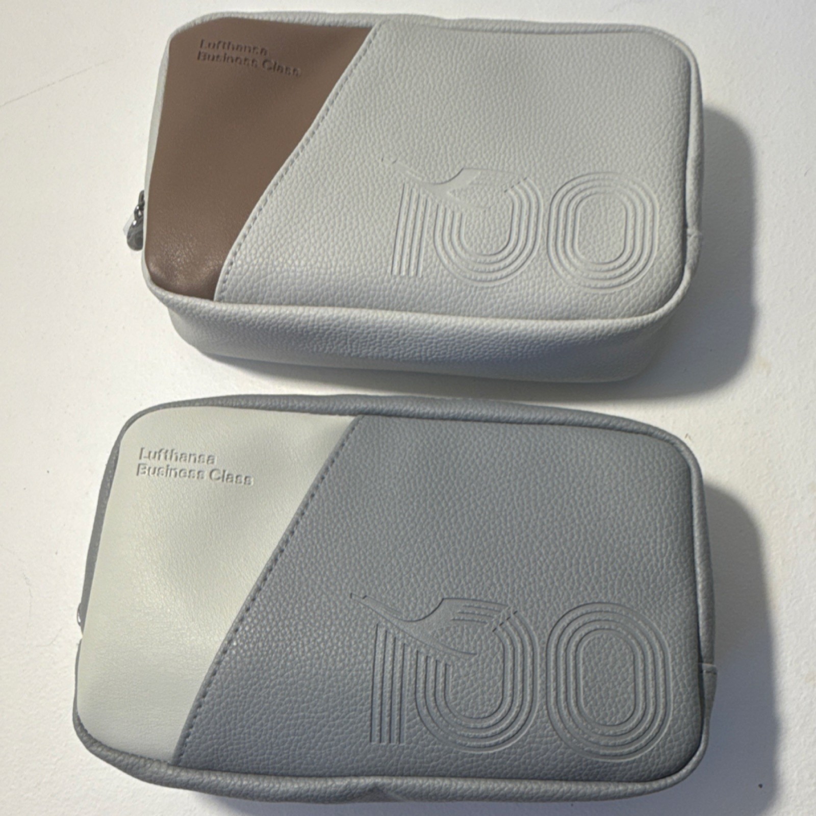 Lufthansa Business Class Amenity Bags Set of 2 Gray White 100 Logo Collectible Lufthansa Business Class Amenity Bags Set of 2 Gray White 100 Logo Collectible