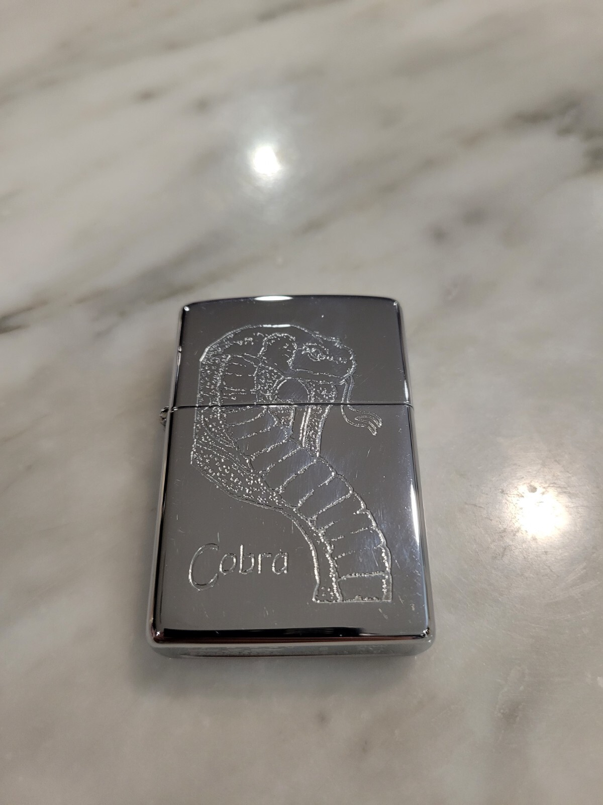 ZIPPO 1999 COBRA ETCHED POLISHED CHROME LIGHTER rare vintage