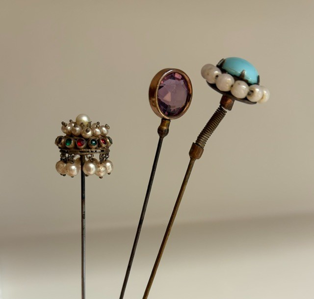 3 antique hat pins and wall hat pin holder