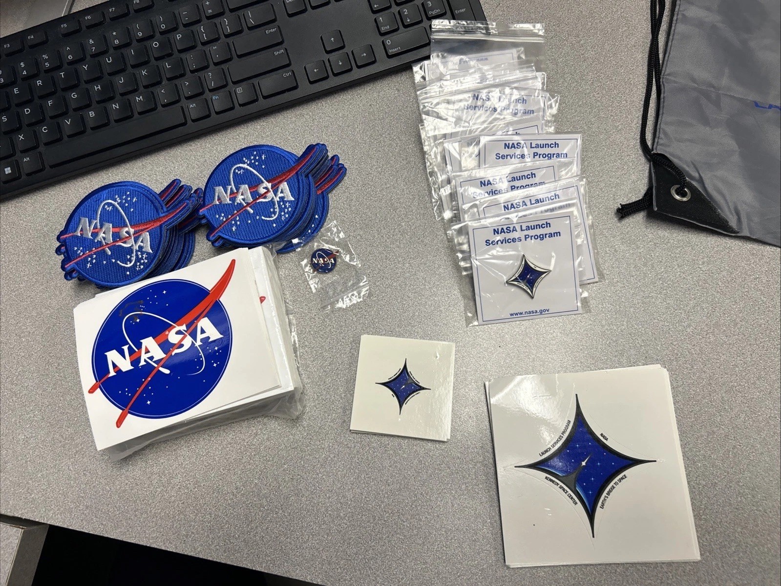 NASA Kennedy Space Center Pin Launch Services Earth's Bridge Lot