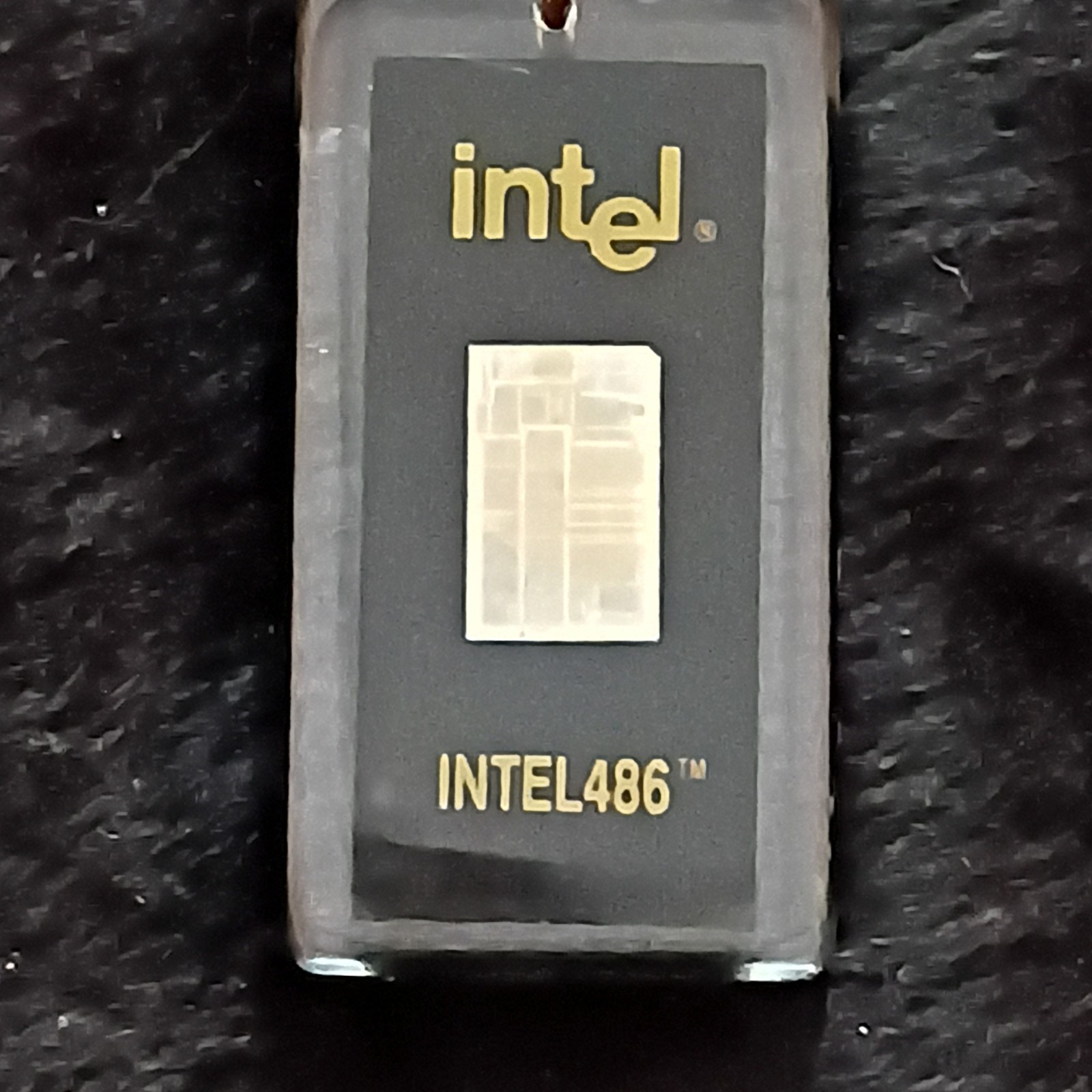 Vintage Intel 386 and 486 processor CPUs - both encased in one acrylic keychain
