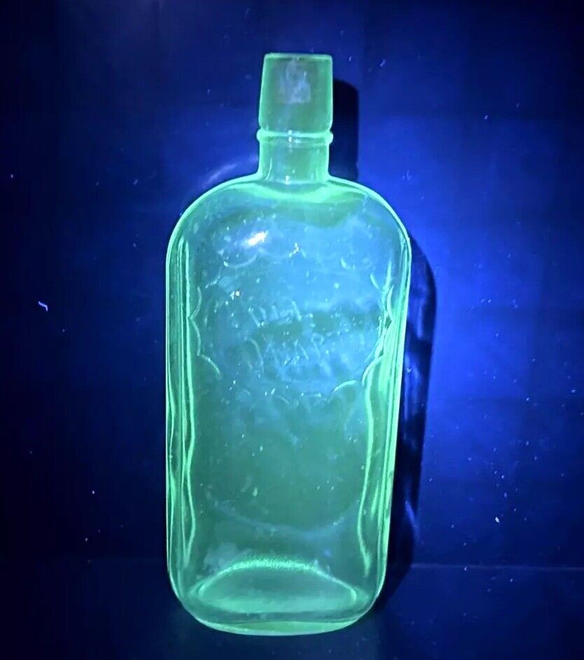 Vintage Clear Glass Quart Bottle Has a Green Manganese Glow