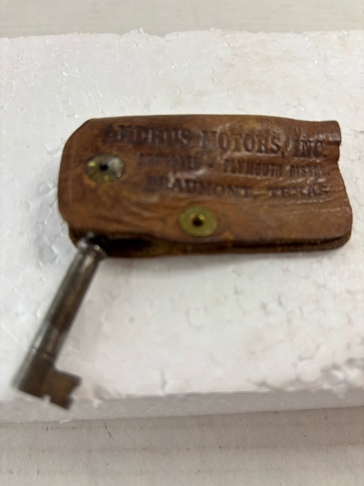 VTG Chrysler-Plymouth Andrus Motors Leather Keychain. Beaumont, Texas