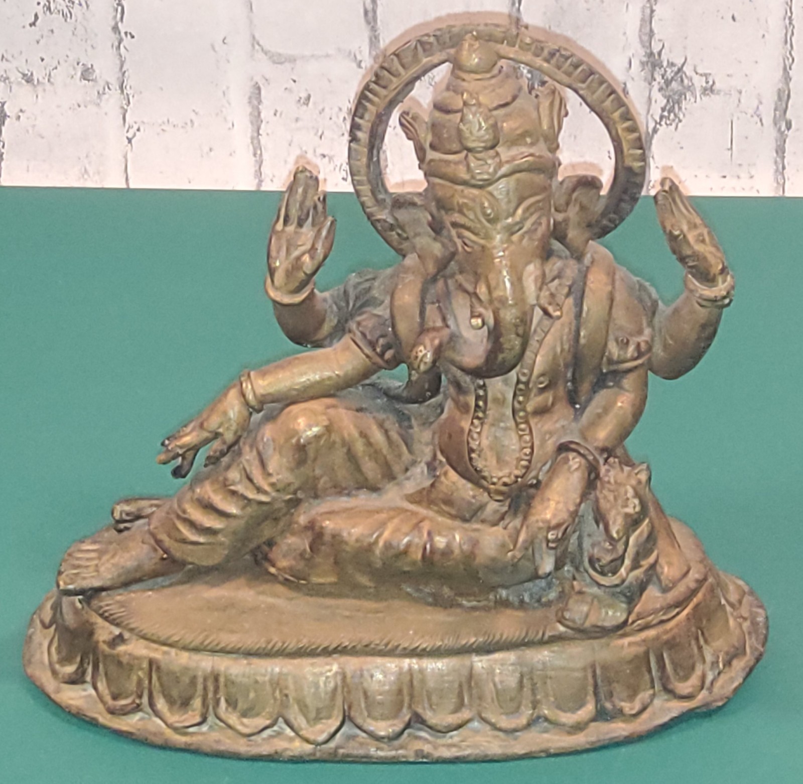 Vintage sitting Ganesha Deity, brass.