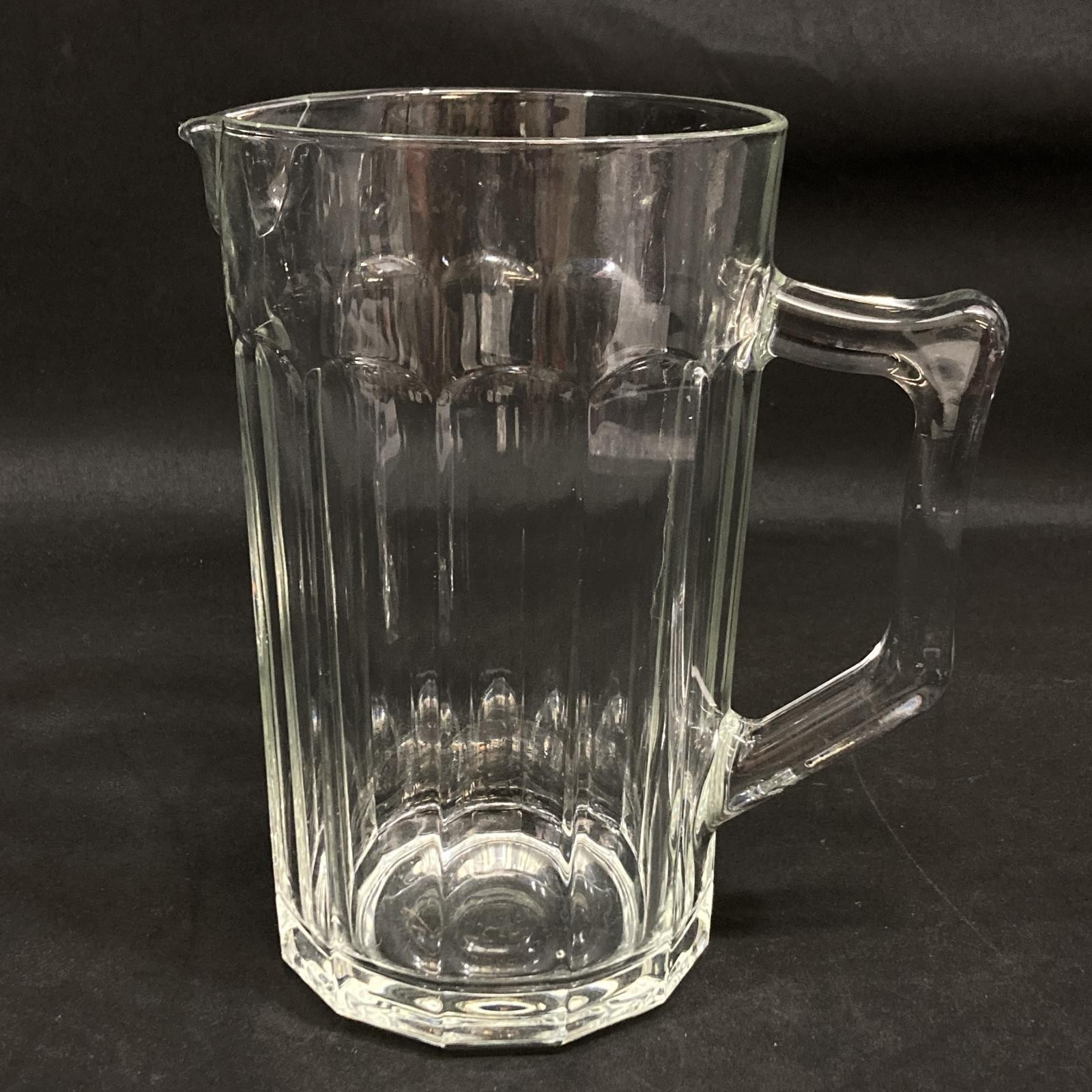 Vintage Ribbed Clear Glass Pitcher with Ice Lip 8.5 Vintage Ribbed Clear Glass Pitcher with Ice Lip 8.5