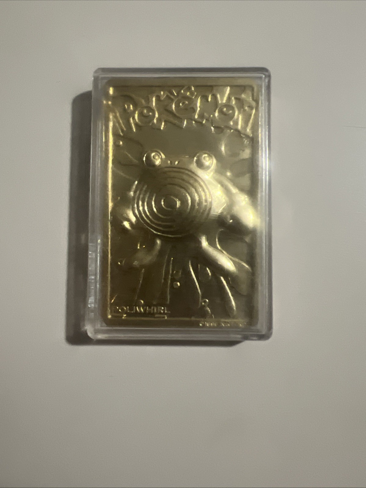 This is a 1999 Burger King Limited Edition 23K Gold-Plated Poliwhirl Pokémon.