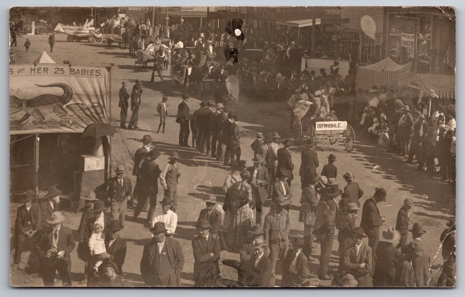 RPPC 1910 Greenfield MO Street Fair Parade Crowd Hipmobile 25 Babies Sign