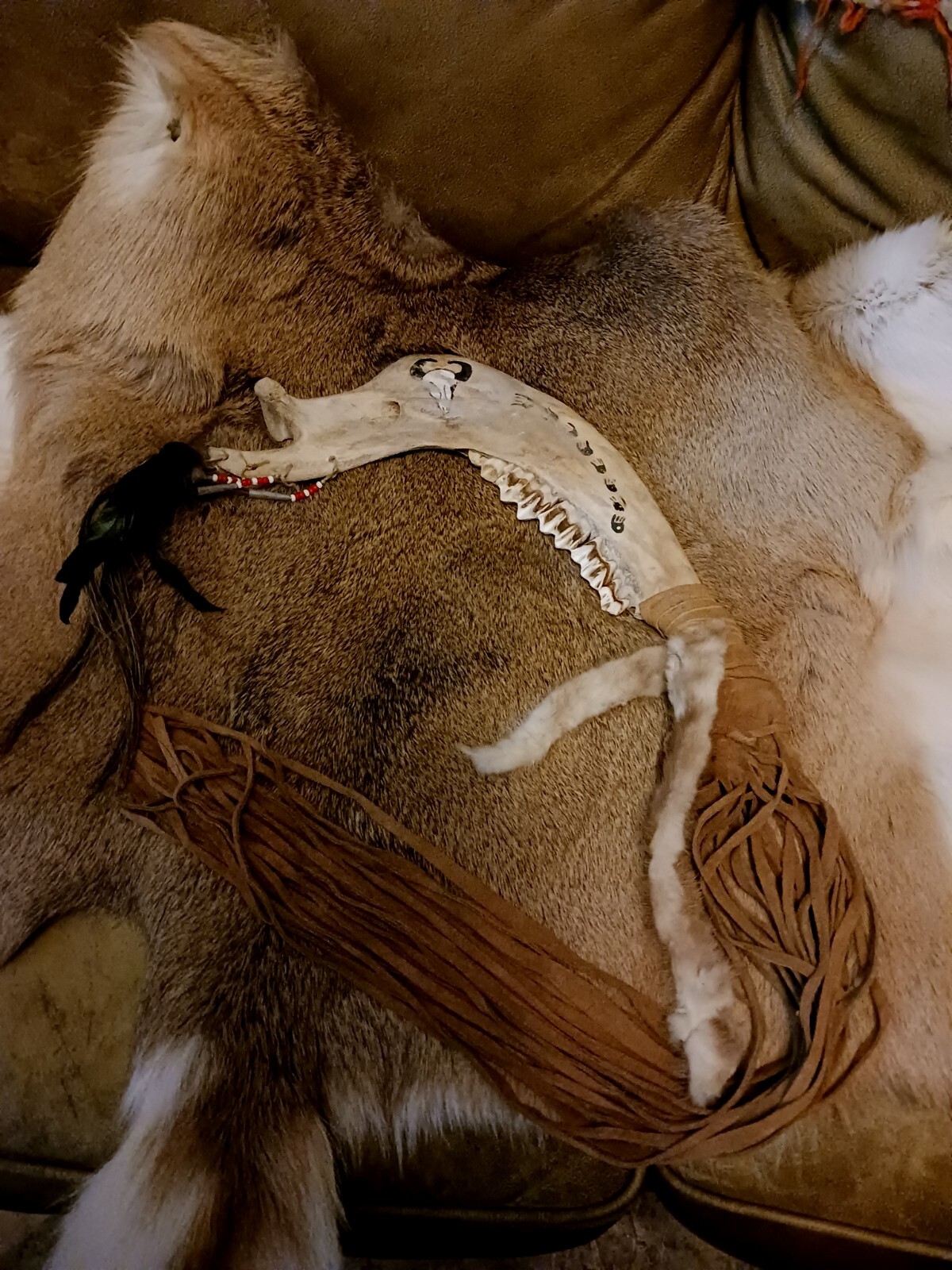 **AWESOME OLDER  NATIVE AMERICAN BISON JAWBONE TOMAHAWK  FRINGE VERY NICE  **