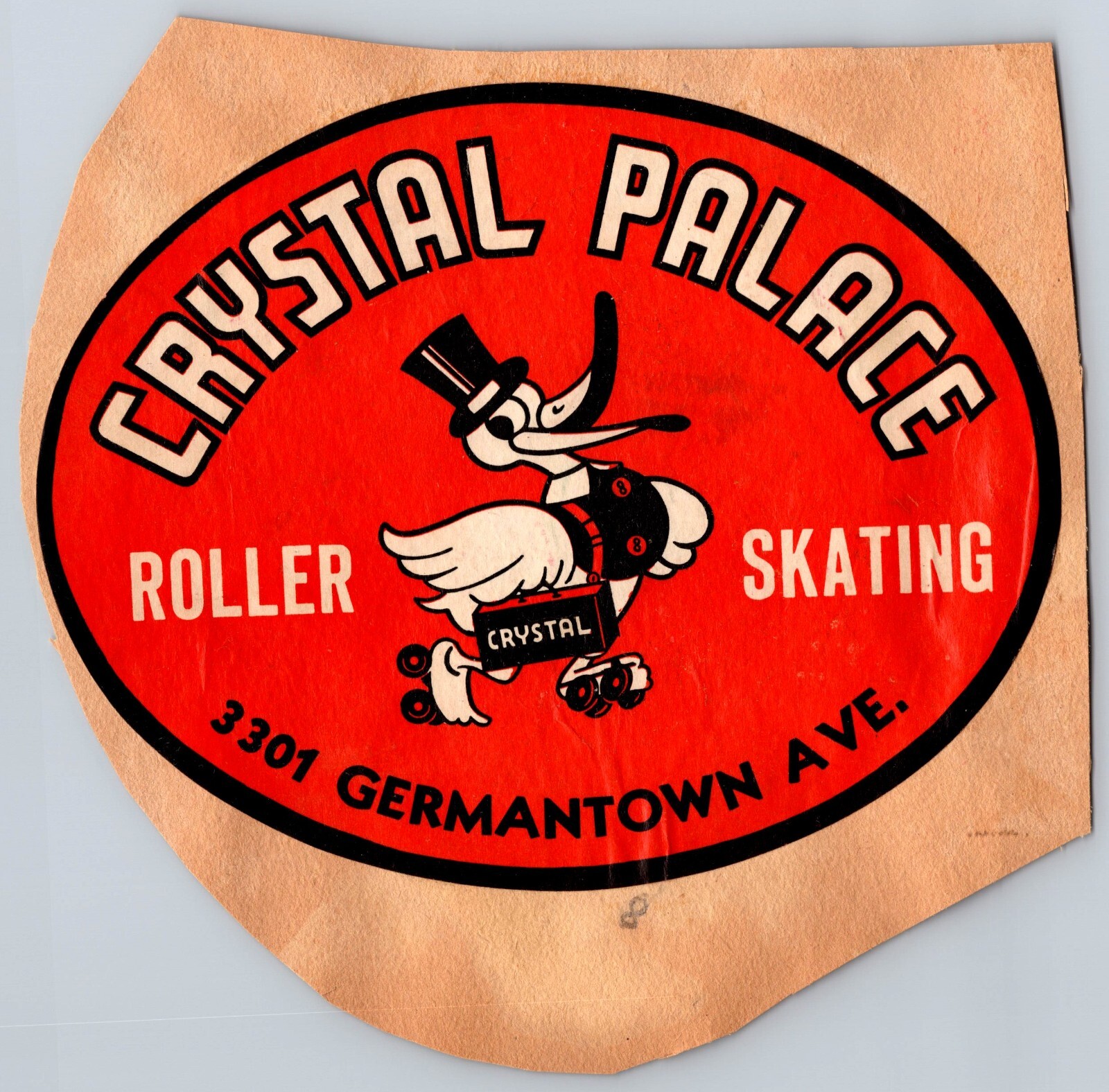 Crystal Palace & Davis Recreation Roller Skating Ad Sticker on a scrapbook page
