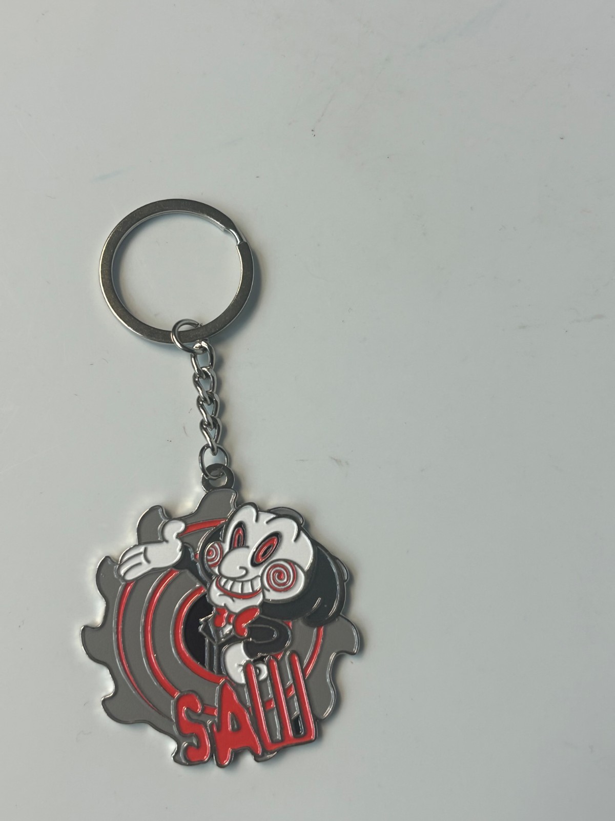 Saw Jigsaw Puppet Spiral Enamel Keychain 2\