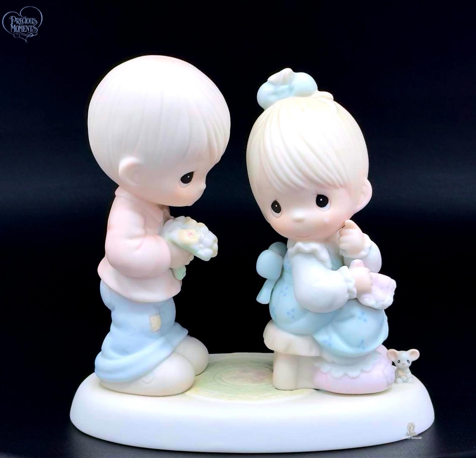 Adorable Precious Moments Figurine - Timeless Sweetness.