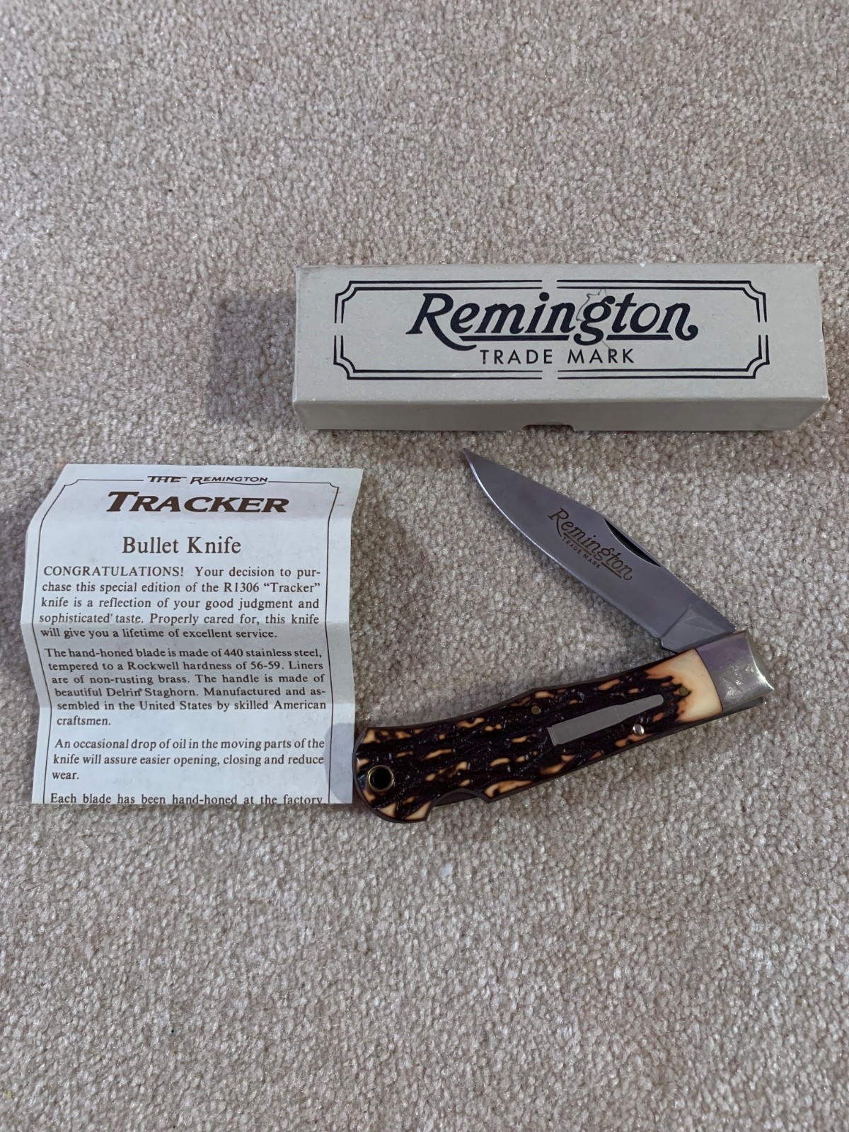 Vintage 1990 Remington R1306 Tracker Bullet knife. Original bix with paperwork.