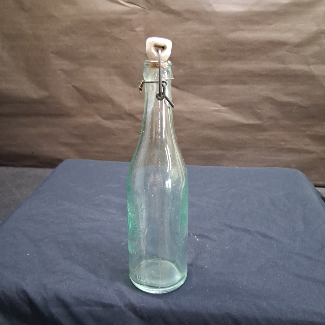 Vintage W.T. Wagner\'s Sons Cincinnati Green Glass Bottle with Porcelain Stopper