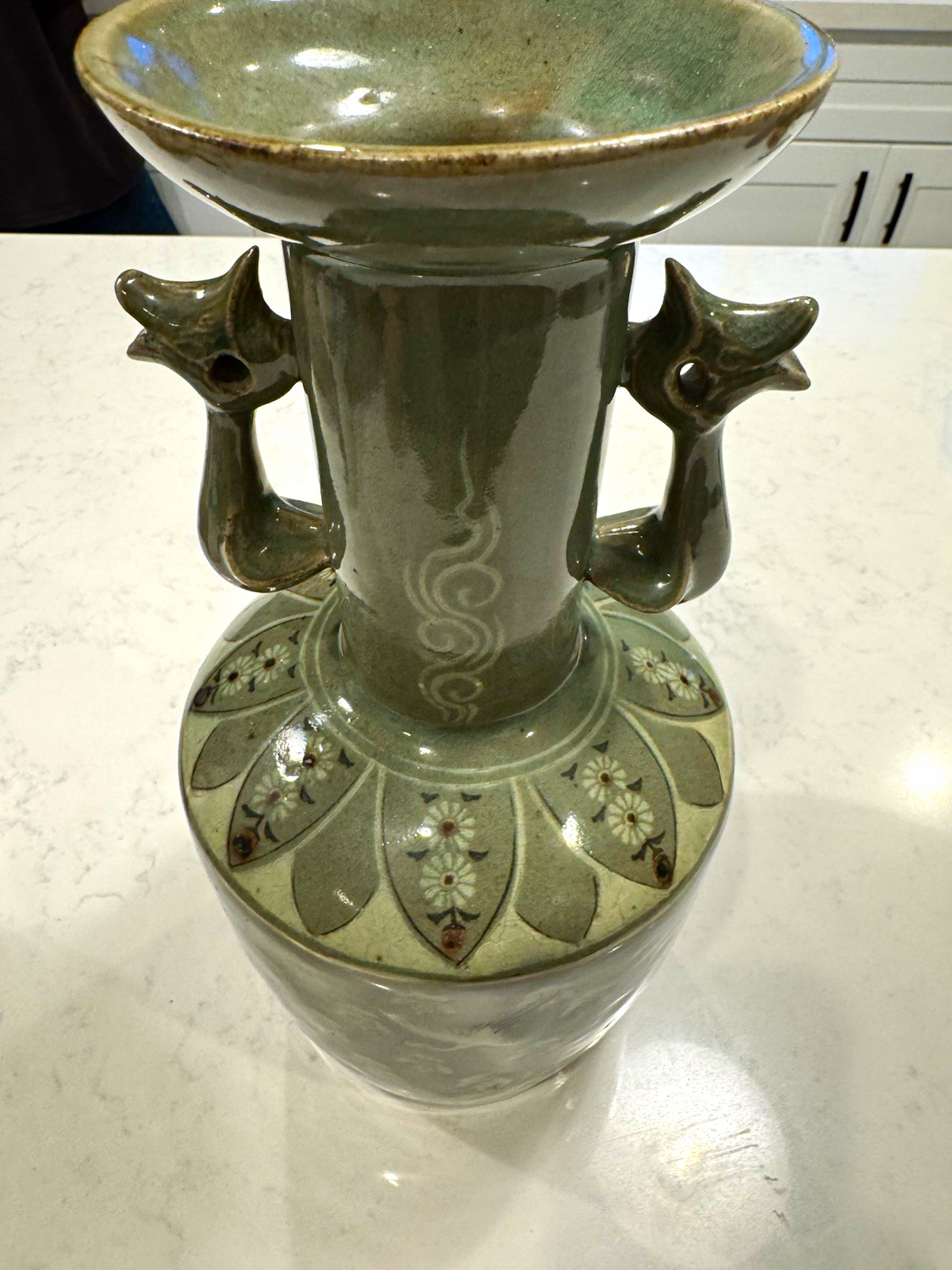 Celadon-glazed ceramic vase in traditional Chinese Longquan Celadon ware style