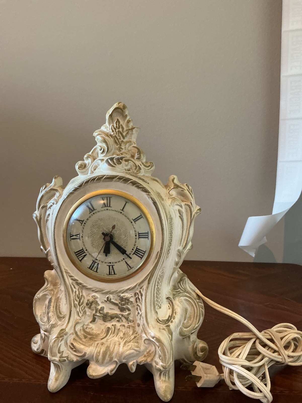 vintage ceramic or porcelain electric mantel clock, likely featuring a Lanshire 